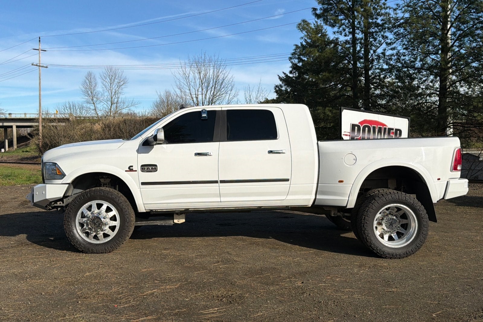 2016 RAM 3500 Laramie Longhorn LIFTED ON AMERICAN FORCES!