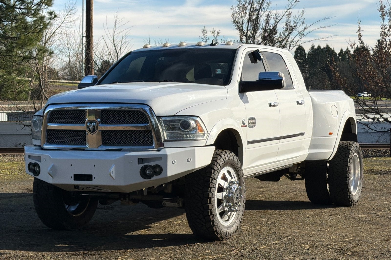 2016 RAM 3500 Laramie Longhorn LIFTED ON AMERICAN FORCES!